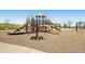 A vibrant community playground provides outdoor recreation with slides and play structures at 10065 Cairns Ct, Highlands Ranch, CO 80130