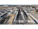 A high angle view of a train station featuring multiple tracks and platforms in a suburban community at 1982 E 129Th Dr, Thornton, CO 80241