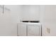 Convenient laundry room equipped with a washer and dryer for easy chore completion at 1982 E 129Th Dr, Thornton, CO 80241