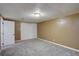 Finished basement area offers comfortable carpeting and closet space at 2389 Nome St, Aurora, CO 80010