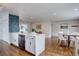 Open-concept kitchen featuring a spacious island and modern appliances at 2389 Nome St, Aurora, CO 80010