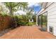 Open wood deck with access to the home's backyard at 8390 E Davies Pl, Centennial, CO 80112