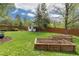 Large backyard with shed and raised garden beds at 8390 E Davies Pl, Centennial, CO 80112