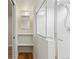 Bathroom featuring updated shower and shelves at 8390 E Davies Pl, Centennial, CO 80112