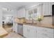Bright kitchen featuring granite countertops, stainless steel appliances, and ample cabinet space at 8390 E Davies Pl, Centennial, CO 80112