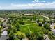 Expansive aerial view showcasing the community park and green spaces, great for recreation at 10009 Dodge Dr, Northglenn, CO 80260