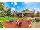 Expansive backyard with firepit area, patio with grill, and covered hot tub area for outdoor entertaining at 10009 Dodge Dr, Northglenn, CO 80260