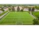 Overhead view of a well-maintained football field ready for play at 10009 Dodge Dr, Northglenn, CO 80260