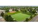 Aerial shot of a sports field with football and baseball fields surrounded by trees and homes at 10009 Dodge Dr, Northglenn, CO 80260