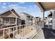 Balcony view of neighboring townhomes in a well-maintained community with gravel landscaping at 5383 Andes St, Denver, CO 80249