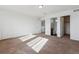 Well-lit bedroom with neutral carpeting, multiple entryways, offering versatility and comfort at 5383 Andes St, Denver, CO 80249