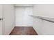 Bright walk-in closet with carpeted floor, shelving, and a chrome clothes rod at 5383 Andes St, Denver, CO 80249