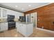 Modern kitchen with white cabinets, granite countertops, and stainless steel appliances at 5009 Mt Osage St, Frederick, CO 80504