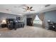 Spacious main bedroom featuring large windows and dark furniture at 5009 Mt Osage St, Frederick, CO 80504