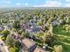 Aerial view of the neighborhood showcasing mature trees, manicured lawns, and well-maintained homes at 10114 Meade Ct, Westminster, CO 80031