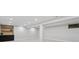 Spacious finished basement area with neutral carpet, light gray walls, and a modern bar area at 10114 Meade Ct, Westminster, CO 80031