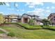Charming home with a brick facade, landscaped yard, and an inviting entrance at 10114 Meade Ct, Westminster, CO 80031