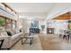 Bright and airy living room featuring vaulted ceilings, hardwood floors, and an open layout at 10114 Meade Ct, Westminster, CO 80031