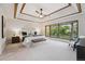 Spacious main bedroom featuring an upholstered headboard, stylish furniture, and large windows with great natural light at 10114 Meade Ct, Westminster, CO 80031