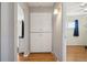 Hallway boasts ample storage cabinets and easy access to other areas of the home at 9271 Gaylord St, Thornton, CO 80229