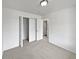 Neutral bedroom featuring a large closet, bright white walls, and carpet at 381 Freestone St, Brighton, CO 80603