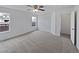 Neutral Primary bedroom with bright white walls, a ceiling fan, and carpet at 381 Freestone St, Brighton, CO 80603