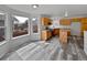 Spacious kitchen featuring stainless steel appliances, wood cabinets, an island and plenty of light at 381 Freestone St, Brighton, CO 80603