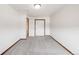 Well-lit bedroom with neutral carpet and a closet, providing ample storage space at 1507 Alpine Ave, Berthoud, CO 80513