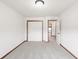 Well-lit bedroom with neutral carpet and a closet, providing ample storage space at 1507 Alpine Ave, Berthoud, CO 80513