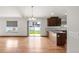 Open kitchen with granite countertops, stainless steel appliances, and a view of the backyard at 1507 Alpine Ave, Berthoud, CO 80513