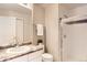 Clean bathroom with shower and granite vanity at 6448 Silver Mesa Dr # B, Highlands Ranch, CO 80130