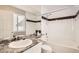 Bathroom with tub, shower, and granite vanity at 6448 Silver Mesa Dr # B, Highlands Ranch, CO 80130