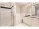 Bathroom boasts double sinks, a soaking tub, and a shower at 6448 Silver Mesa Dr # B, Highlands Ranch, CO 80130