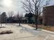 Community center entrance with landscaping and paved pathway at 6448 Silver Mesa Dr # B, Highlands Ranch, CO 80130