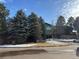 Exterior view of community center with large windows at 6448 Silver Mesa Dr # B, Highlands Ranch, CO 80130