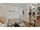 Well-organized bedroom showing desk, storage, and decor at 4820 W 13 Ave, Denver, CO 80204