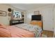 Cozy bedroom with a queen bed, offering a tranquil retreat at 4820 W 13 Ave, Denver, CO 80204