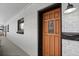 Inviting front door with glass detail and window, set in a brick building at 4820 W 13 Ave, Denver, CO 80204
