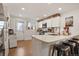 Open kitchen with white cabinets, providing a clean and efficient cooking space at 4820 W 13 Ave, Denver, CO 80204