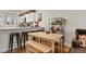 Bright kitchen with stainless steel appliances and a breakfast bar, ideal for modern living at 4820 W 13 Ave, Denver, CO 80204
