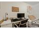 Functional work area features built in desk, modern decor and artwork at 4820 W 13 Ave, Denver, CO 80204