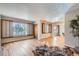 Bright living room with hardwood floors and large windows at 1871 Teller St, Lakewood, CO 80214