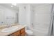Bright bathroom with a shower and tub combination at 6973 W Louisiana Ave # E, Denver, CO 80232