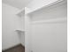 Walk-in closet features a clothes rack and shelving at 6973 W Louisiana Ave # E, Denver, CO 80232