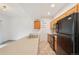 Bright kitchen features stainless steel appliances and a tile floor at 6973 W Louisiana Ave # E, Denver, CO 80232