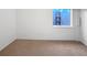 The finished basement offers extra living space and a bright window at 960 Milo Cir # B, Lafayette, CO 80026