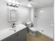 This bathroom features tile floors, modern vanity, updated fixtures, and a standing shower at 960 Milo Cir # B, Lafayette, CO 80026