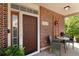 Charming front porch with seating, decorative touches, and a welcoming ambiance at 8318 Devinney Ct, Arvada, CO 80005