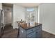 Charming kitchen island with granite countertop and barstool seating in a bright space at 8318 Devinney Ct, Arvada, CO 80005