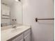 Bathroom features a white vanity, mirror, and classic fixtures at 2949 Shady Holw, Boulder, CO 80304